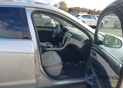 2014 Cadillac Srx Luxury Collection z USA, uszkodzony, nr VIN 3GYFNEE35ES664073